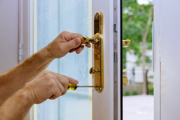 close up professional locksmith installing repairing new deadbolt lock 73110 8721